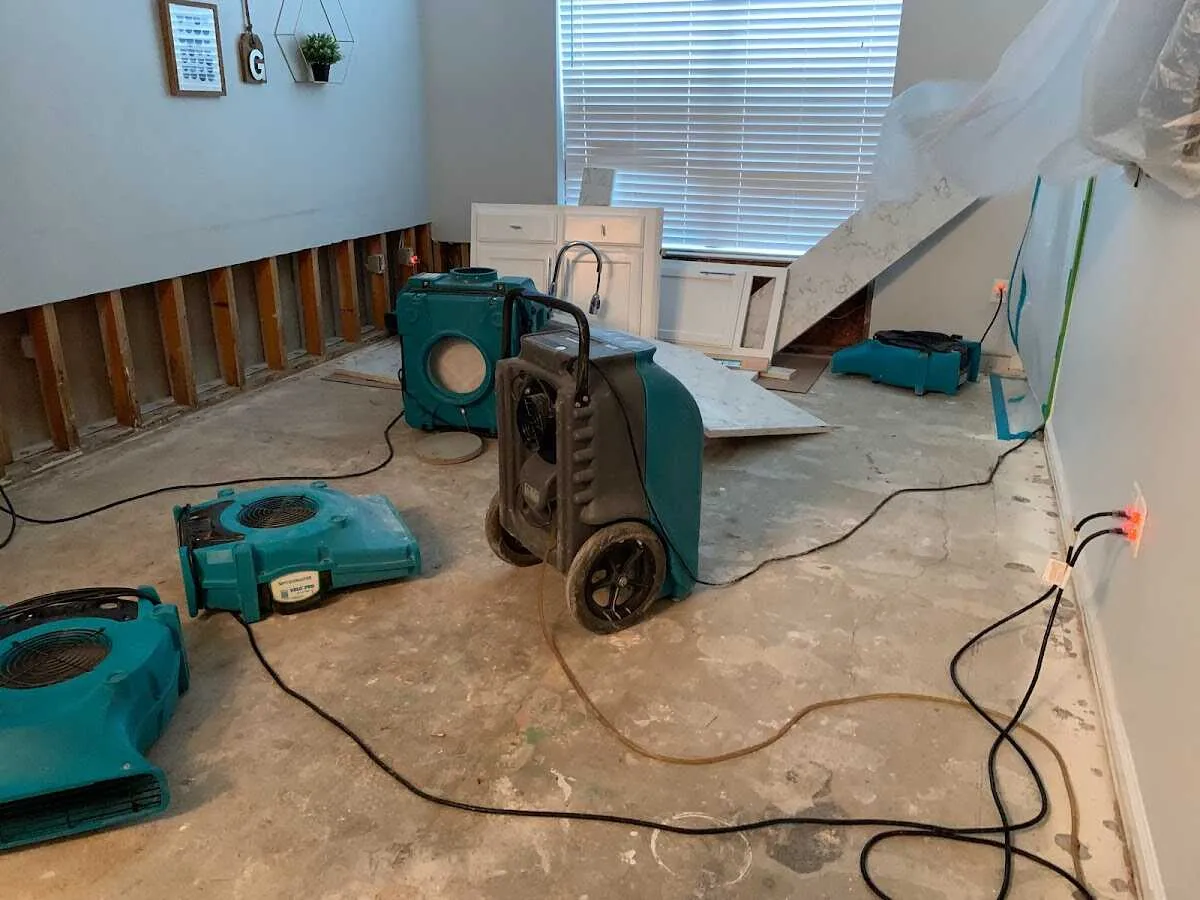 Dehumidifier in flood-cut room for Water Damage Restoration in Moreau