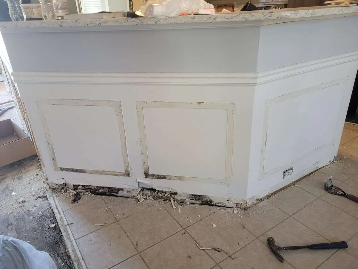 Water damage and mold on kitchen during Storm Damage Restoration in Moreau
